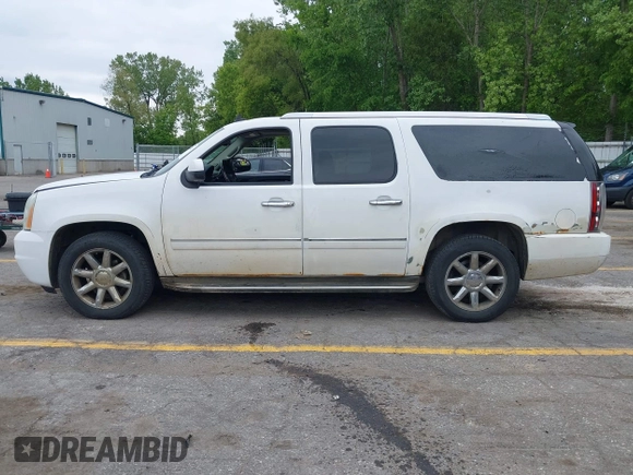 2011 GMC Yukon XL Denali z VIN 1GKS2MEF2BR190877, wystawiony jako IAAI lot #42364202 z przebiegiem 160 063 mil mil oraz . Historia ofert i sprzedaży dostępna na DreamBid. Obrazek 14.
