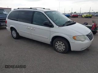 2005 Chrysler Town & Country LX z VIN 2C4GP44R35R209336, wystawiony jako IAAI lot #42495805 z przebiegiem 167 085 mil mil oraz . Historia ofert i sprzedaży dostępna na DreamBid. Obrazek 1.