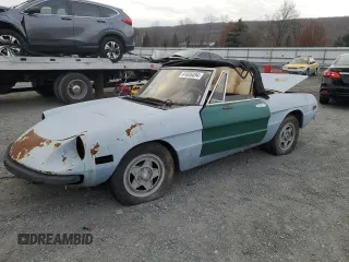 1982 Alfa Romeo Spider Veloce z VIN ZARBA5412C1015044, wystawiony jako Copart lot #81636494 z przebiegiem 51 587 mil mil oraz Tytuł czysty. Historia ofert i sprzedaży dostępna na DreamBid. Obrazek 1.