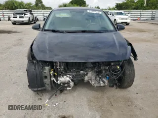 2022 Kia Rio S with VIN 3KPA24AD1NE454960, listed as a Copart auction lot 61937574 with 28,452 mi miles and Salvage Title. Bid and sale history available at carsss.com. Image 5.