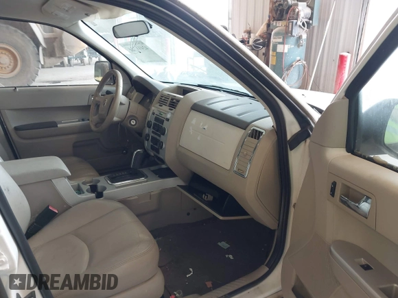 2008 Mercury Mariner with VIN 4M2CU91158KJ33778, listed as a IAAI auction lot 42411724 with 168,359 mi miles and . Bid and sale history available at DreamBid. Image 5.