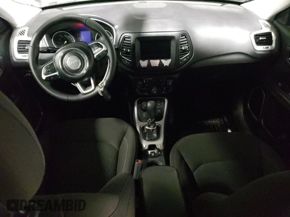 2019 Jeep Compass Sport with VIN 3C4NJDAB0KT802788, listed as a Copart auction lot 39840144 with 121,229 mi miles and Salvage title. Bid and sale history available at DreamBid. Image 8.