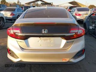 2018 Honda Clarity with VIN JHMZC5F15JC018312, listed as a IAAI auction lot 41354648 with 97,035 mi miles and . Bid and sale history available at DreamBid. Image 16.