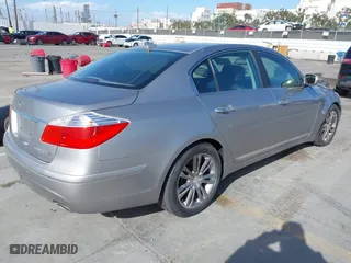 2009 Hyundai Genesis with VIN KMHGC46FX9U045182, listed as a IAAI auction lot 41936573 with 101,860 mi miles. Bid and sale history available at carsss.com. Image 4.