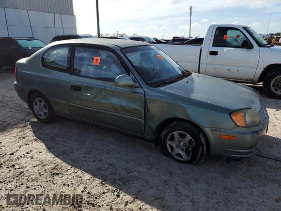2005 Hyundai Accent GLS with VIN KMHCG35C75U328380, listed as a Copart auction lot 74935354 with 4,848 mi miles and Salvage Title. Bid and sale history available at carsss.com. Image 4.