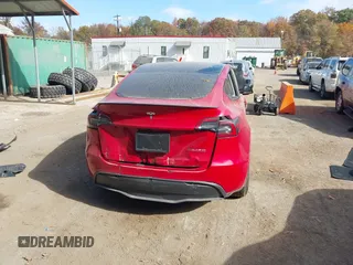 2023 Tesla Model Y Performance with VIN 7SAYGDEF6PF870935, listed as a IAAI auction lot 40718563 with 15,286 mi miles and . Bid and sale history available at DreamBid. Image 16.