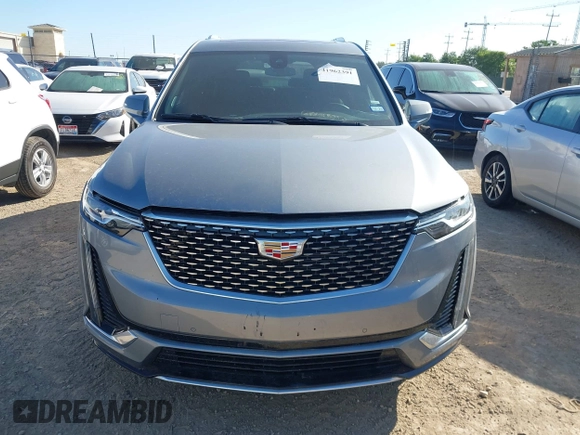 2025 Cadillac XT6 FWD Premium Luxury with VIN 1GYKPCRS3SZ118384, listed as a IAAI auction lot 41962391 with 6,946 mi miles. Bid and sale history available at carsss.com. Image 12.