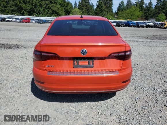 2021 Volkswagen Jetta SEL with VIN 3VWE57BUXMM099832, listed as a Copart auction lot 58607035 with 71,519 mi miles and Salvage title. Bid and sale history available at DreamBid. Image 6.