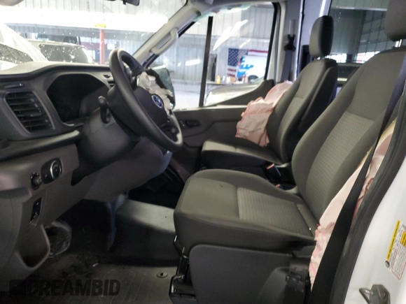 2024 Ford Transit Cargo with VIN 1FTBR1C88RKA39474, listed as a Copart auction lot 86339884 with Not Provided miles and Salvage Title. Bid and sale history available at DreamBid. Image 7.