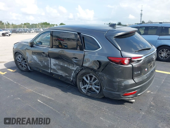 2021 Mazda CX-9 Touring с VIN JM3TCACY4M0511512, выставлен на аукционе IAAI как лот 42376544 с пробегом 50 485 миль миль и . История ставок и продаж доступна на DreamBid. Изображение 3.
