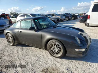 1995 Porsche 911 Carrera with VIN WP0AA2994SS323280, listed as a Copart auction lot 75304104 with 105,675 mi miles and Salvage Title. Bid and sale history available at carsss.com. Image 4.