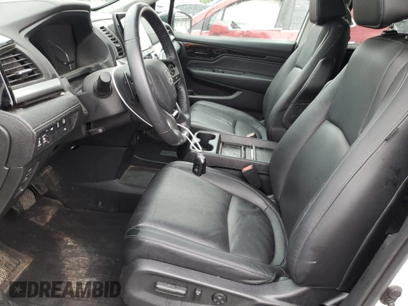 2023 Honda Odyssey Touring with VIN 5FNRL6H86PB049842, listed as a Copart auction lot 55992424 with 27,423 mi miles and Non Repairable. Bid and sale history available at DreamBid. Image 7.