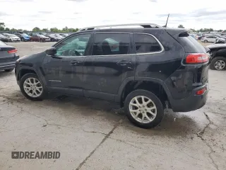 2018 Jeep Cherokee Latitude with VIN 1C4PJLCB5JD595996, listed as a Copart auction lot 57868775 with 135,431 mi miles and Salvage title. Bid and sale history available at DreamBid. Image 2.