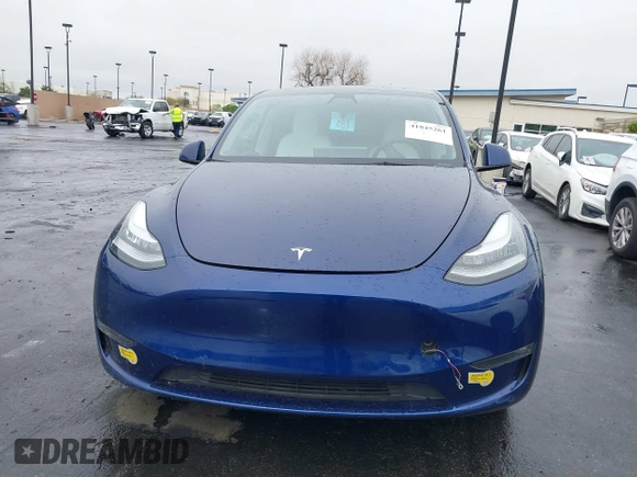 2022 Tesla Model Y Long Range with VIN 7SAYGDEE7NF409294, listed as a IAAI auction lot 41845261 with 73,116 mi miles and . Bid and sale history available at DreamBid. Image 12.