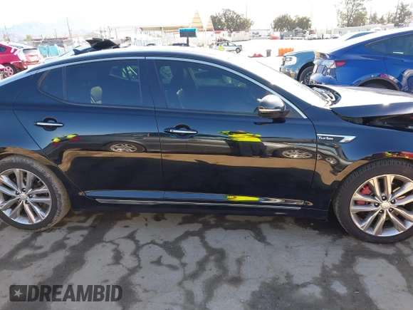 2015 Kia Optima SX Turbo with VIN 5XXGR4A63FG447041, listed as a IAAI auction lot 41812337 with 177,868 mi miles. Bid and sale history available at carsss.com. Image 14.