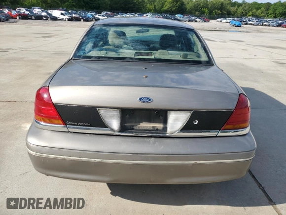 2003 Ford Police Interceptor Street Appear with VIN 2FAFP71W73X148322, listed as a Copart auction lot 55573035 with 268,812 mi miles and Salvage title. Bid and sale history available at DreamBid. Image 6.