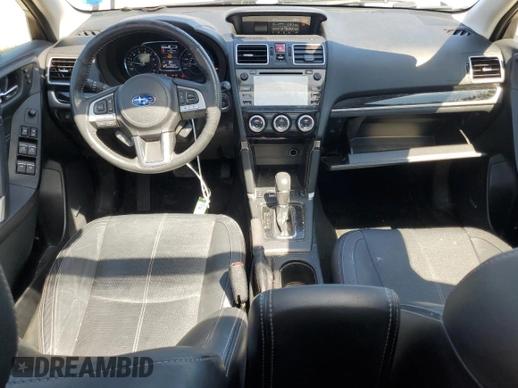 2017 Subaru Forester Touring with VIN JF2SJAWC2HH429099, listed as a Copart auction lot 64671135 with 104,709 mi miles and Salvage title. Bid and sale history available at DreamBid. Image 8.