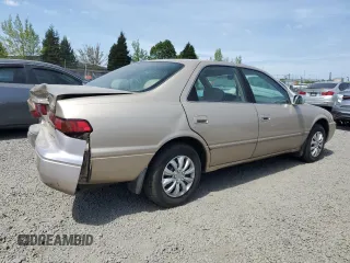 1999 Toyota Camry LE с VIN JT2BG22K6X0369818, выставлен на аукционе Copart как лот 54369385 с пробегом 246 320 миль миль и Списание • Salvage title. История ставок и продаж доступна на DreamBid. Изображение 3.