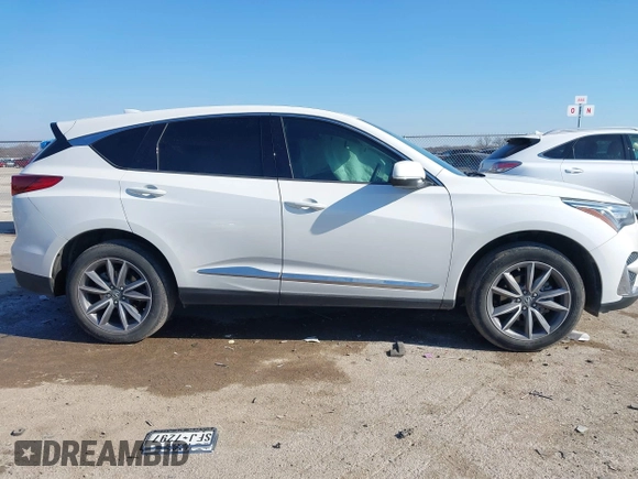 2020 Acura RDX Technology with VIN 5J8TC1H59LL011089, listed as a IAAI auction lot 41246036 with 66,261 mi miles and . Bid and sale history available at DreamBid. Image 13.