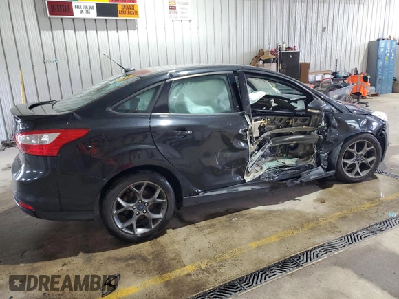 2013 Ford Focus SE with VIN 1FADP3F21DL348827, listed as a Copart auction lot 63589405 with 144,156 mi miles and Salvage title. Bid and sale history available at DreamBid. Image 3.