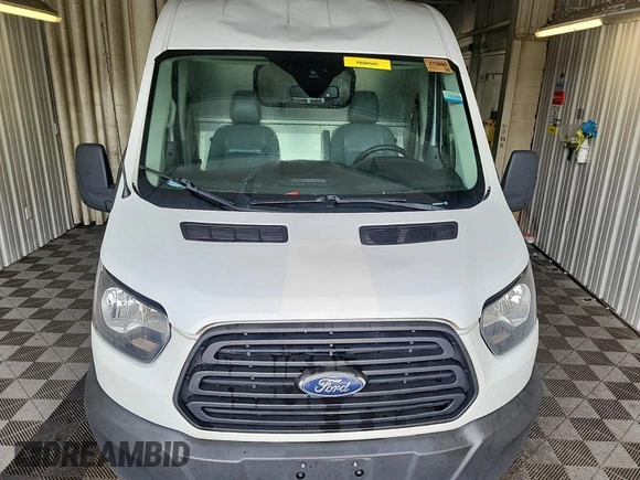 2019 Ford Transit with VIN 1FTYR2CM5KKA04040, listed as a IAAI auction lot 42715725 with 175,169 mi miles and . Bid and sale history available at DreamBid. Image 12.