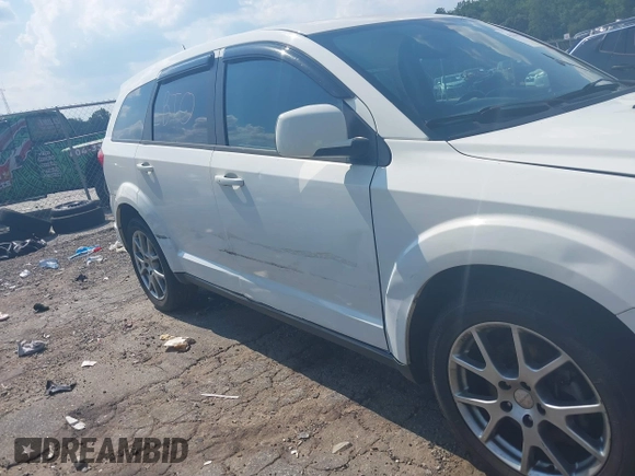 2014 Dodge Journey R/T with VIN 3C4PDCEG8ET277273, listed as a IAAI auction lot 42564252 with 122,840 mi miles and . Bid and sale history available at DreamBid. Image 6.