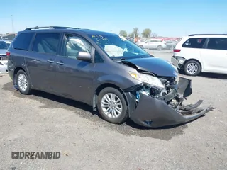 2015 Toyota Sienna XLE with VIN 5TDYK3DC4FS634937, listed as a IAAI auction lot 41869781 with 65,561 mi miles. Bid and sale history available at carsss.com. Image 1.