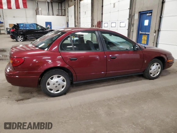 2002 Saturn SL with VIN 1G8ZH52822Z228302, listed as a Copart auction lot 58043985 with 153,058 mi miles and Salvage title. Bid and sale history available at DreamBid. Image 3.