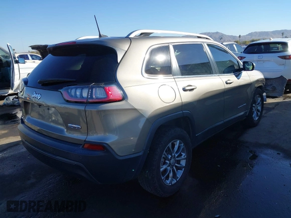 2020 Jeep Cherokee Latitude Plus with VIN 1C4PJLLB5LD521965, listed as a IAAI auction lot 41232028 with 77,729 mi miles. Bid and sale history available at carsss.com. Image 4.