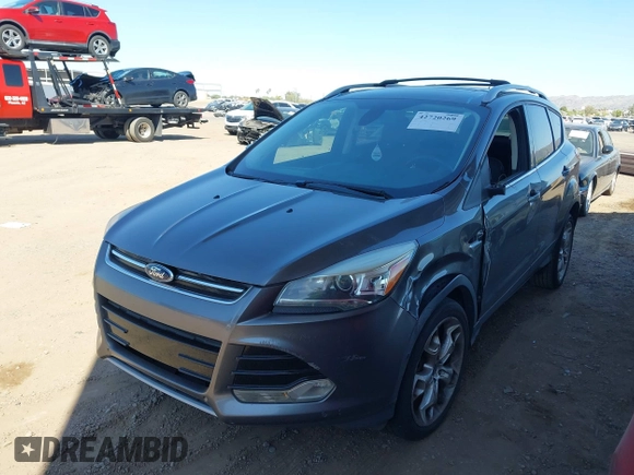 2013 Ford Escape Titanium with VIN 1FMCU0J95DUA29390, listed as a IAAI auction lot 42720269 with 147,413 mi miles and . Bid and sale history available at DreamBid. Image 6.