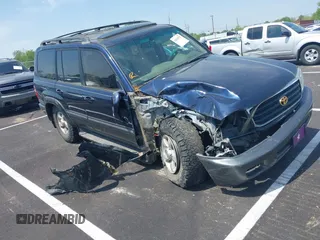 2000 Toyota Land Cruiser with VIN JT3HT05J8Y0123024, listed as a IAAI auction lot 42028792 with 360,074 mi miles. Bid and sale history available at carsss.com. Image 1.