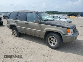 1996 Jeep Grand Cherokee Limited with VIN 1J4GZ78S3TC395758, listed as a Copart auction lot 60326205 with Not provided miles and Salvage title. Bid and sale history available at DreamBid. Image 4.