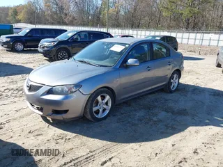 2006 Mazda 3 i Touring with VIN JM1BK32FX61416288, listed as a IAAI auction lot 41882749 with 140,396 mi miles and . Bid and sale history available at DreamBid. Image 2.