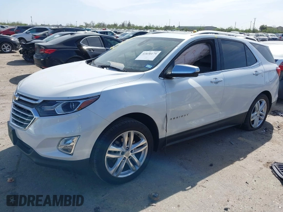 2018 Chevrolet Equinox Premier with VIN 2GNAXWEX3J6141427, listed as a IAAI auction lot 41830179 with 76,707 mi miles and . Bid and sale history available at carsss.com. Image 16.