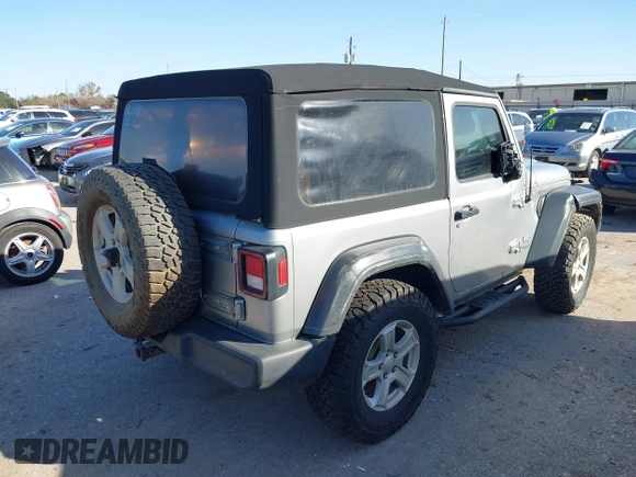 2018 Jeep Wrangler Sport S with VIN 1C4GJXAG0JW156196, listed as a IAAI auction lot 41193078 with 80,428 mi miles and . Bid and sale history available at DreamBid. Image 4.