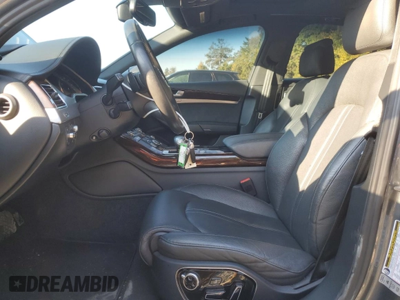 2015 Audi A8 with VIN WAUJGAFD3FN013026, listed as a Copart auction lot 67650374 with 88,064 mi miles and Salvage title. Bid and sale history available at DreamBid. Image 7.