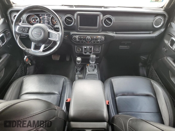 2018 Jeep Wrangler Unlimited Sahara with VIN 1C4HJXEG0JW141101, listed as a Copart auction lot 56573195 with 143,854 mi miles and Salvage title. Bid and sale history available at DreamBid. Image 8.