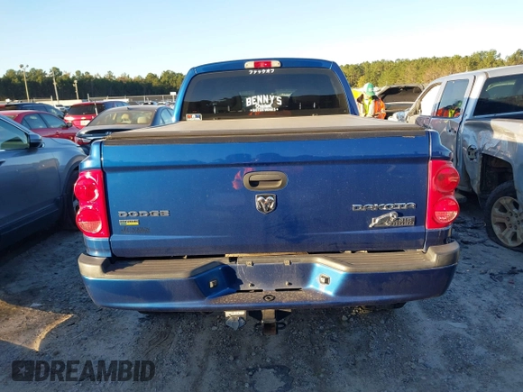 2010 Dodge Dakota Bighorn/Lonestar with VIN 1D7CW3GP5AS130870, listed as a IAAI auction lot 40929651 with 128,077 mi miles. Bid and sale history available at carsss.com. Image 15.