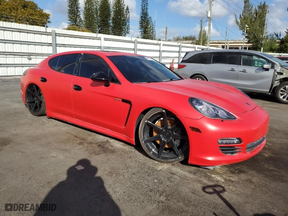 2012 Porsche Panamera S Hybrid with VIN WP0AD2A79CL045571, listed as a Copart auction lot 44125025 with 79,985 mi miles and Salvage Title. Bid and sale history available at carsss.com. Image 4.