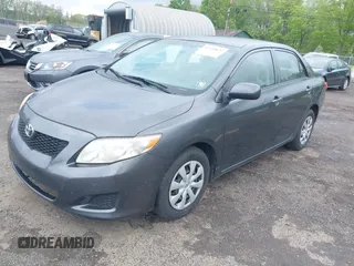 2009 Toyota Corolla with VIN JTDBL40E999048446, listed as a IAAI auction lot 42210822 with 260,005 mi miles. Bid and sale history available at carsss.com. Image 2.