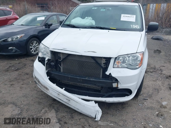 2015 Dodge Grand Caravan SE with VIN 2C4RDGBG2FR714404, listed as a IAAI auction lot 41860254 with 212,599 mi miles and . Bid and sale history available at DreamBid. Image 6.