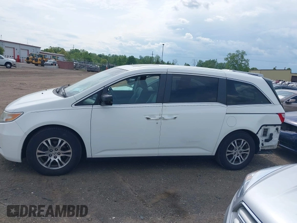 2011 Honda Odyssey EX-L с VIN 5FNRL5H61BB081079, выставлен на аукционе IAAI как лот 42393271 с пробегом 97 754 миль миль и . История ставок и продаж доступна на DreamBid. Изображение 14.