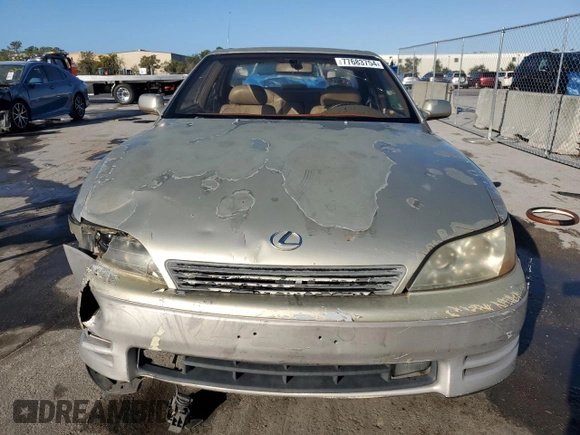 1995 Lexus ES 300 with VIN JT8GK13T6S0101694, listed as a Copart auction lot 77683754 with 247,984 mi miles and Salvage Title. Bid and sale history available at DreamBid. Image 5.