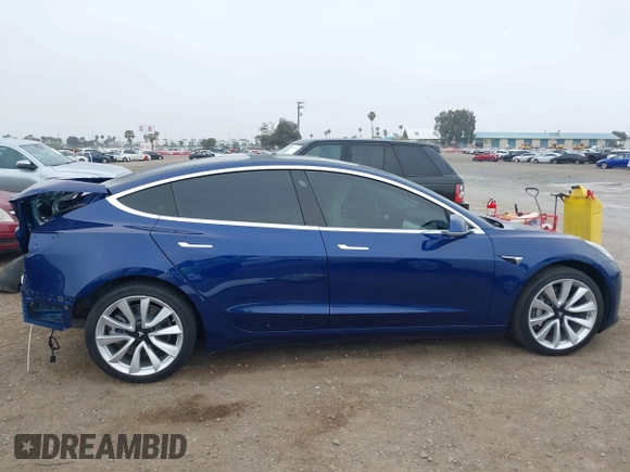 2020 Tesla Model 3 Standard Range Plus with VIN 5YJ3E1EA1LF802648, listed as a IAAI auction lot 42208034 with 27,231 mi miles and . Bid and sale history available at DreamBid. Image 13.