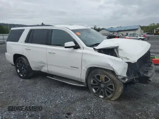 2016 GMC Yukon SLT with VIN 1GKS2BKC2GR440401, listed as a Copart auction lot 73728634 with 97,449 mi miles and Salvage Title. Bid and sale history available at carsss.com. Image 4.
