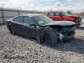 2018 Dodge Charger SXT Plus with VIN 2C3CDXHG2JH329120, listed as a Copart auction lot 49746455 with 106,182 mi miles and Salvage Title. Bid and sale history available at carsss.com. Image 4.
