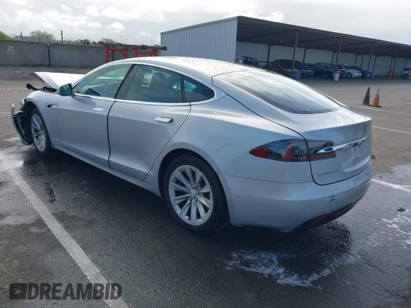 2018 Tesla Model S 75D with VIN 5YJSA1E2XJF287825, listed as a IAAI auction lot 41912116 with Not Provided miles and . Bid and sale history available at DreamBid. Image 3.