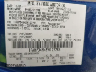 2008 Ford Focus S with VIN 1FAHP34N48W122283, listed as a IAAI auction lot 41845603 with 160,661 mi miles. Bid and sale history available at carsss.com. Image 9.