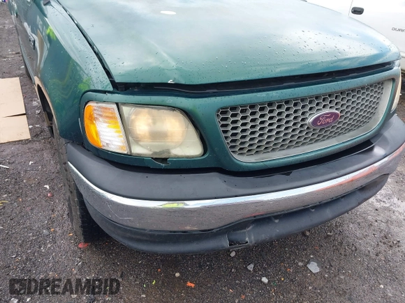 1999 Ford F-150 с VIN 1FTZX1729XNA84770, выставлен на аукционе IAAI как лот 42104198 с пробегом Не указан миль и . История ставок и продаж доступна на DreamBid. Изображение 6.