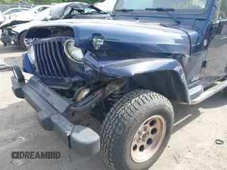 2006 Jeep Wrangler X with VIN 1J4FA39S36P763346, listed as a IAAI auction lot 42321825 with 104,077 mi miles and . Bid and sale history available at DreamBid. Image 6.